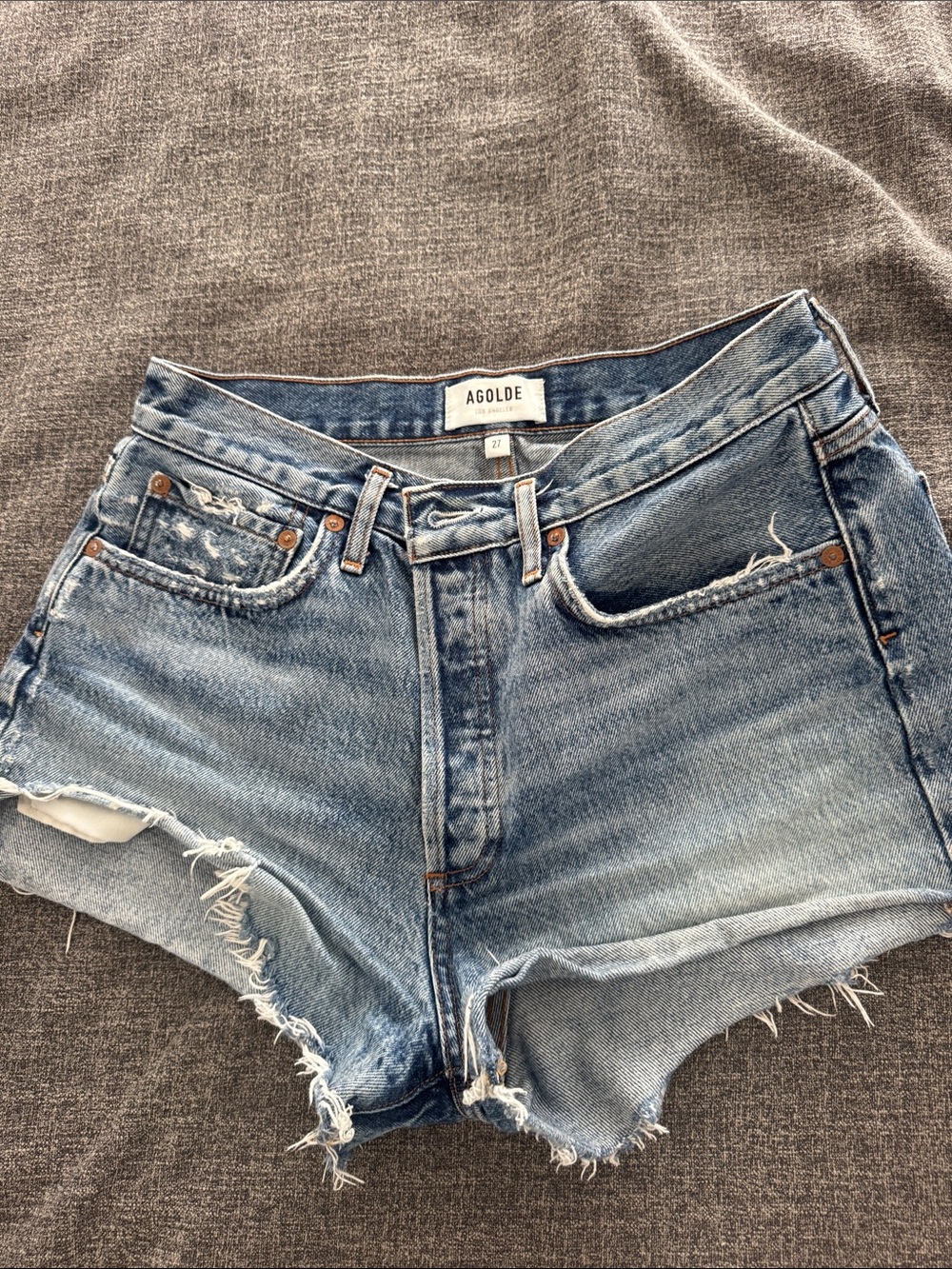 Agolde Medium Wash Distressed Denim Cutoff Shorts